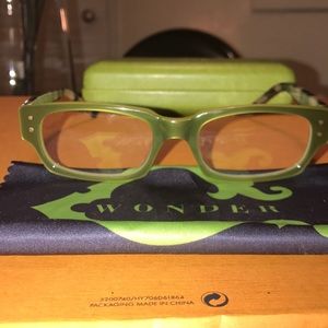 C wonder green and tortoise shell glasses.